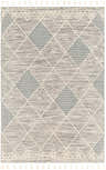 Close-up of the Bicos Tasseled Jute Rug. Charcoal, cream, and gray rug with geometric diamond pattern and tassels. Design-Rectangle-576