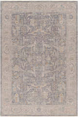 Close-up of the Binx Thick Luxe Statement Rug. Traditional pattern in brown, charcoal, dusty sage, and gray. Design-Rectangle-6796