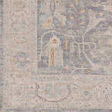 Close-up of Binx rug showing traditional design in brown, charcoal, dusty sage, medium gray, and teal. Luxe texture. Swatch