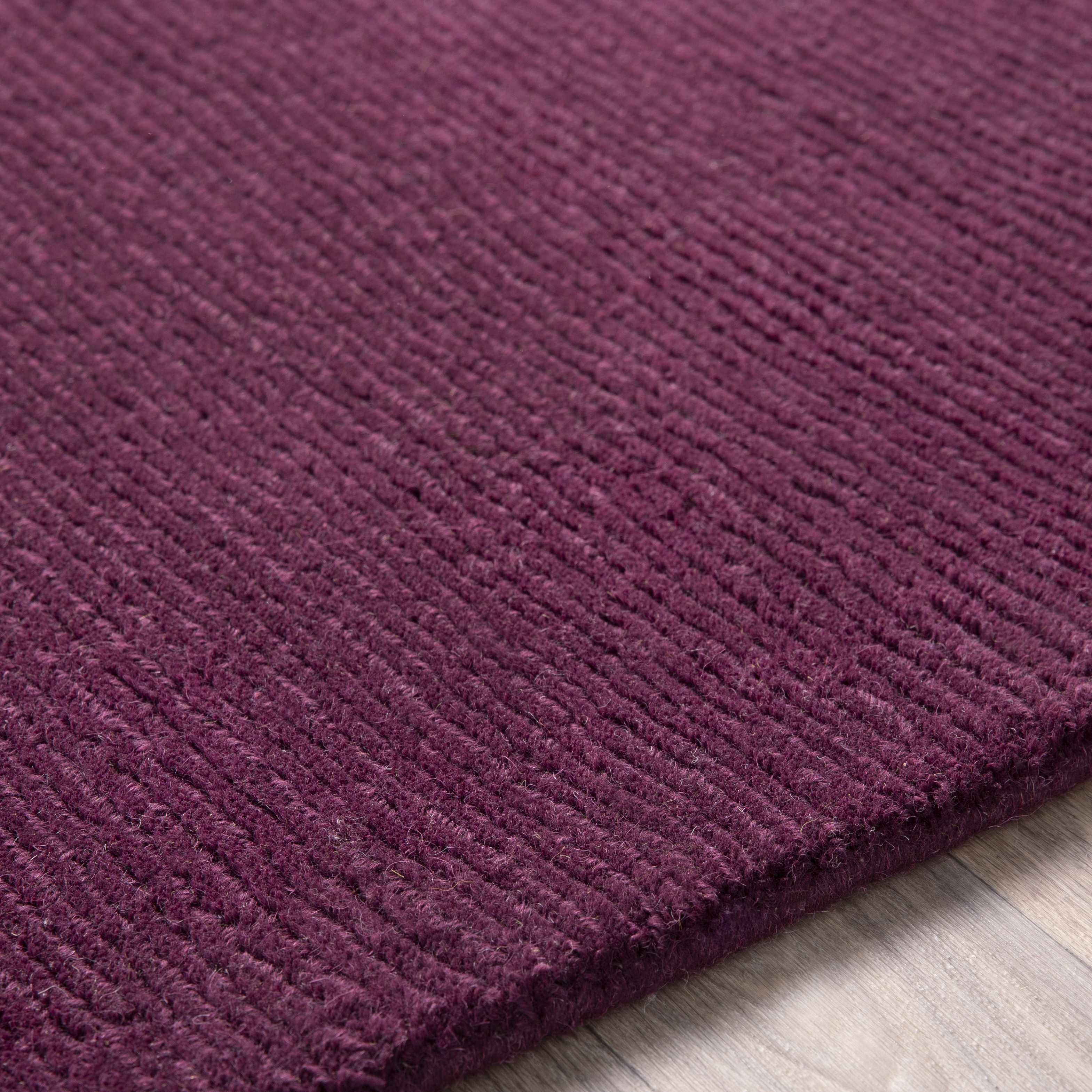 Close-up of the texture on Biola Area Rug - Clearance, showing fabric weave and feel. Contemporary Area Rug Backing Canvas 