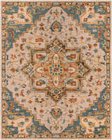 Detailed Birtley Area Rug close-up. Hand-tufted wool rug with a traditional, symmetrical design in blue, tan, rust, and olive tones. Design-Rectangle-810