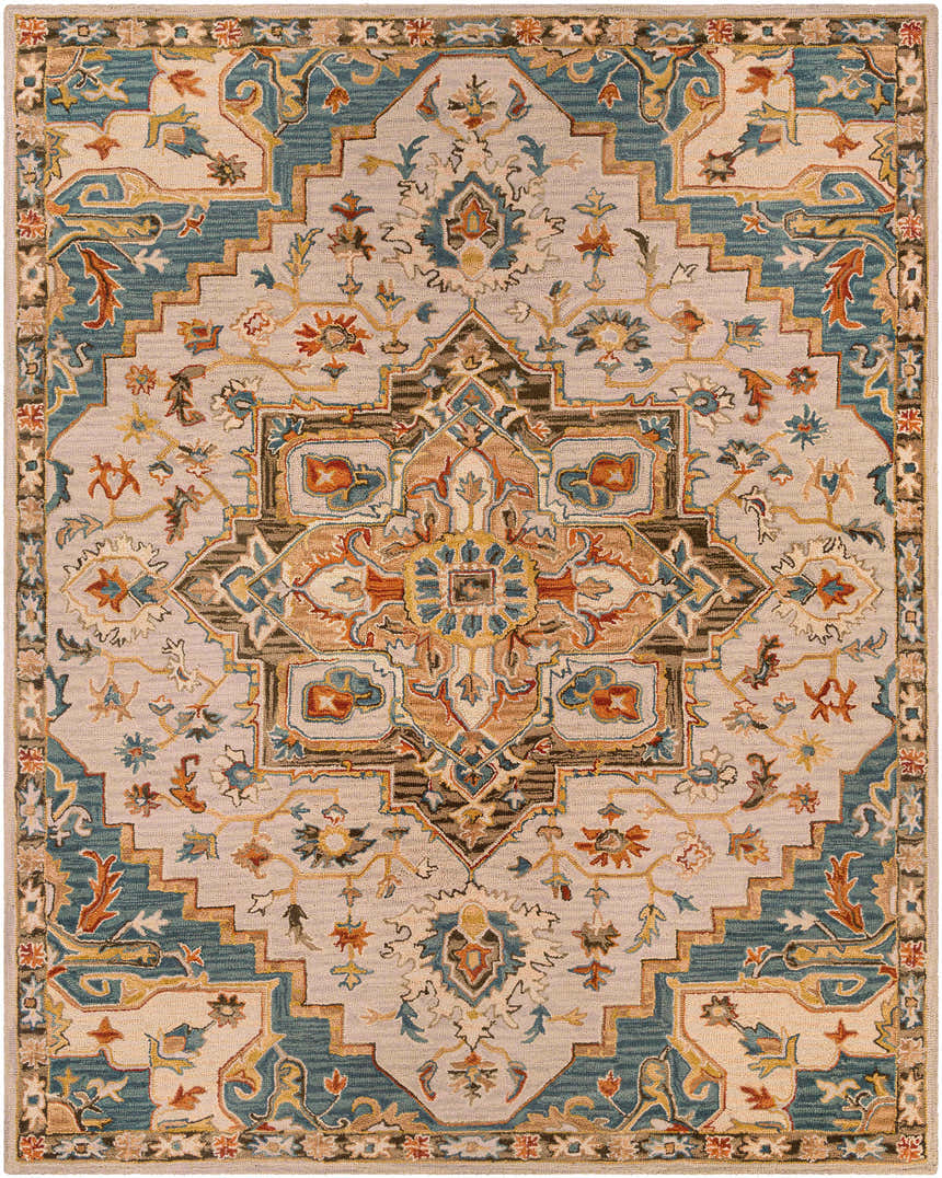 Detailed Birtley Area Rug close-up. Hand-tufted wool rug with a traditional, symmetrical design in blue, tan, rust, and olive tones. Design-Rectangle-810