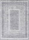 Close-up of the Blarney Area Rug, a machine-woven rectangle in charcoal, cream, and gray with a traditional, geometric pattern. Design-Rectangle-537