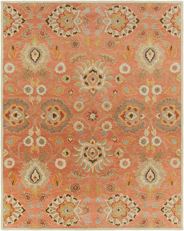 Close-up of the Conesus 1112 rug. Hand-tufted wool rug with a traditional floral pattern in beige, brown, and brick red on a burnt orange ground. Design-Rectangle-7696