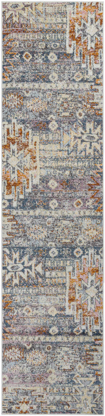 Close-up of the Blackmoor Aztec Area Rug. Southwestern style rug in blue, orange, pink, and white hues. Design-Runner-2710