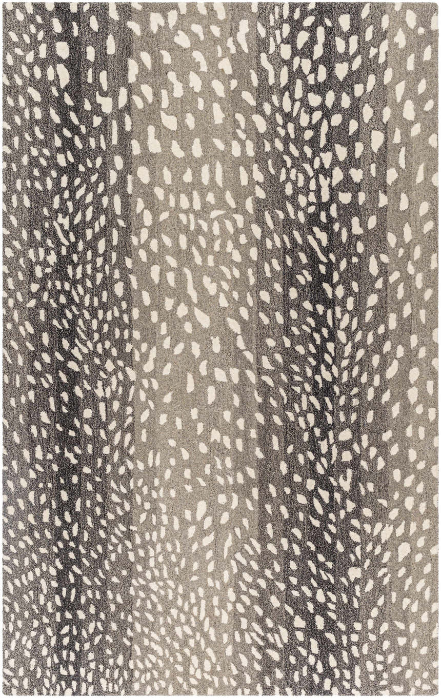 Close-up of the Athena Giraffe Print Wool Rug, featuring a beige and charcoal animal print design. Hand-tufted texture. Design-Rectangle-58