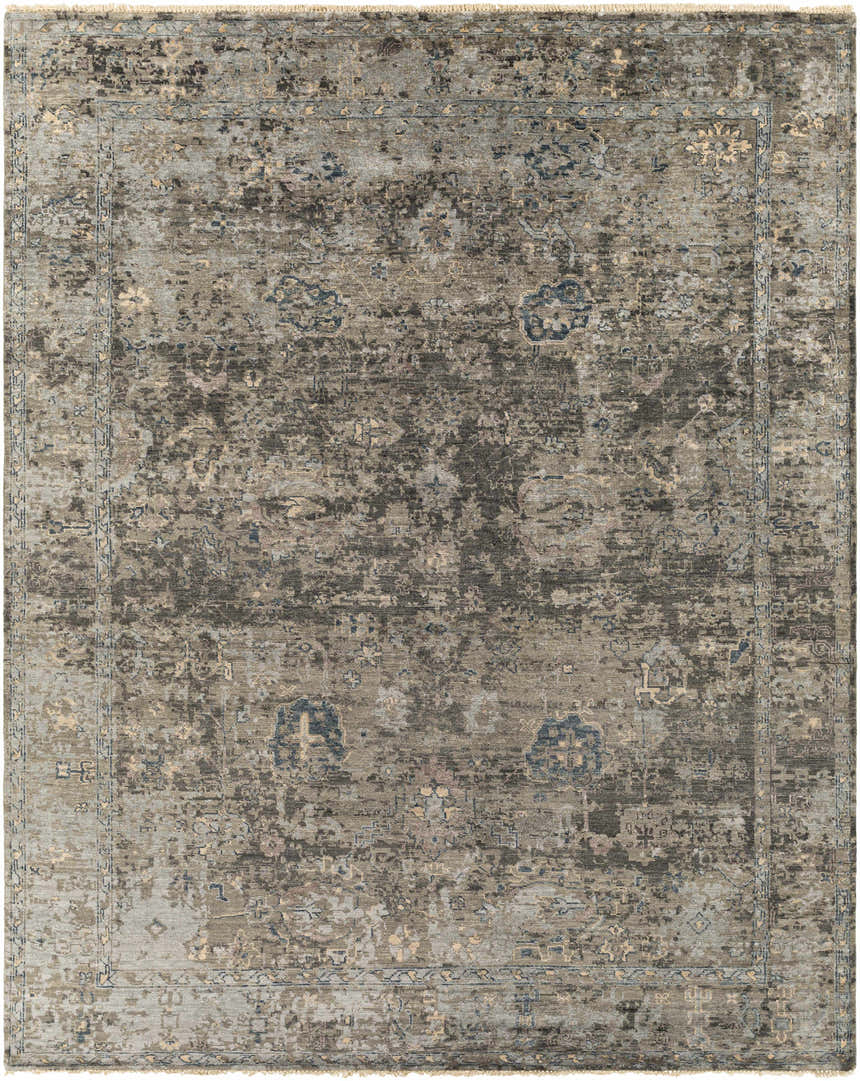 Close-up of the Ballantrae Premium Rug. Hand-knotted viscose rug in beige, charcoal, dark blue, and brown with an oriental pattern. Design-Rectangle-810
