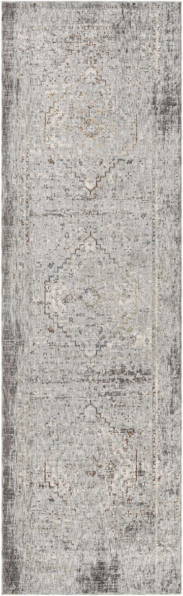 Close-up of the Boli Distressed Statement Rug. Features a vintage, oriental design in blue, gray, ivory, and light olive tones. Design-Runner-3310