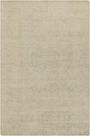 Close-up of hand-knotted Bonnerdale Area Rug. Beige and cream wool rug with traditional farmhouse pattern. Design-Rectangle-5686