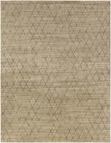 Close-up of the Bonogin Area Rug. Hand-loomed, farmhouse style with a tan background and dark brown geometric diamond pattern. Design-Rectangle-810