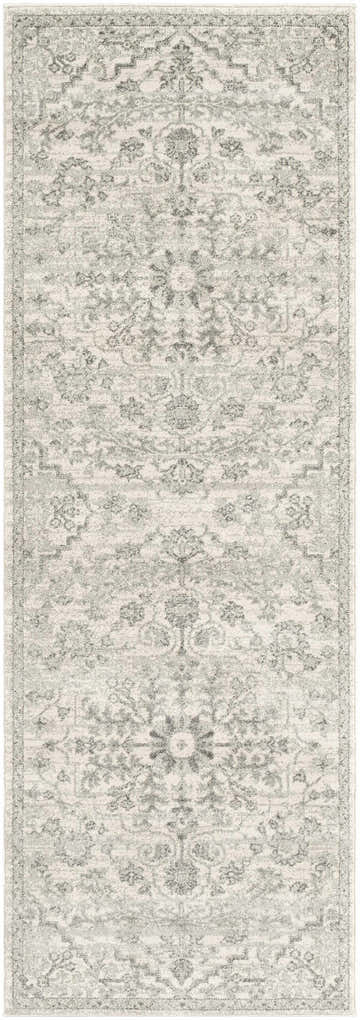 Close-up of the Borowski Area Rug, a machine-woven runner with a traditional gray and beige floral pattern. Design-Runner-2710