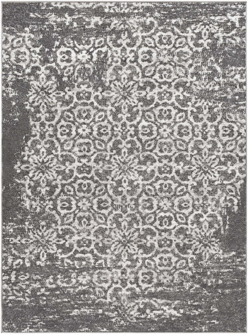 Close-up of the Bowden Carpet - Clearance, featuring a traditional floral pattern in charcoal, light gray, and white tones. Design-Rectangle-5373