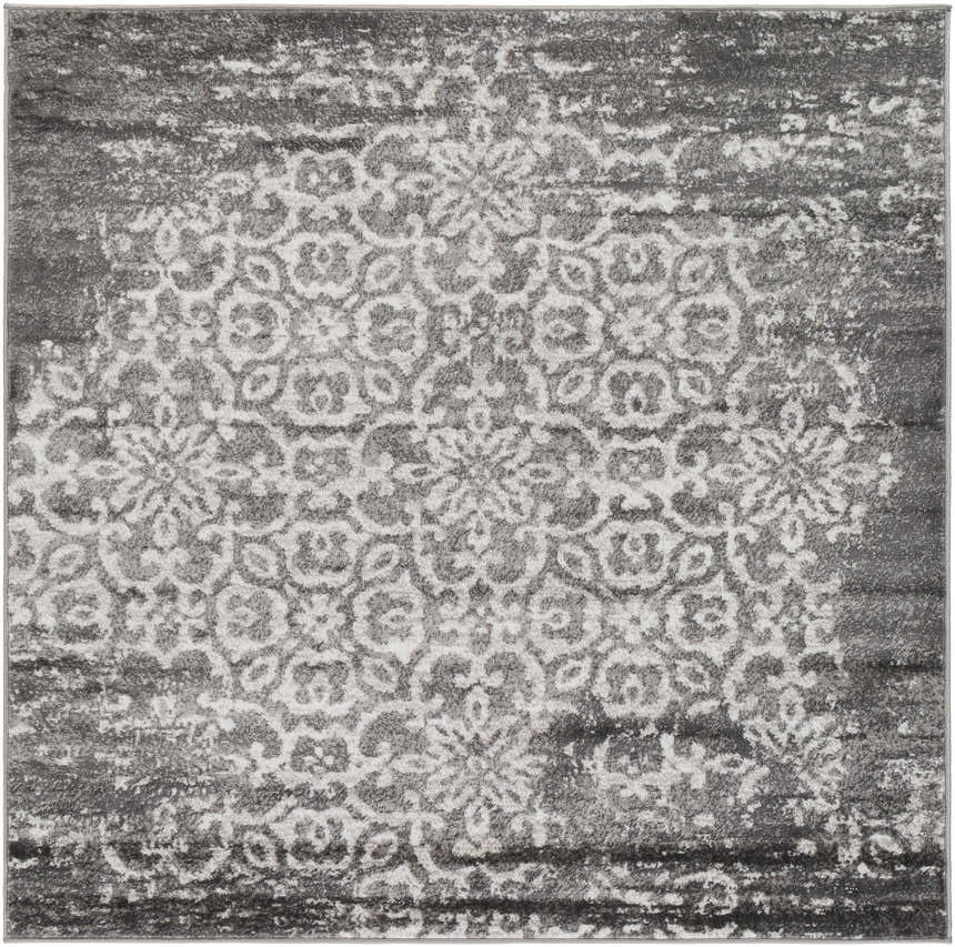 Close-up of the Bowden Carpet in charcoal, light gray, and white. Traditional floral medallion design with distressed texture. Design-Square-53