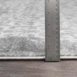 Close-up of Bowden Carpet showing the pile height and gray, charcoal and white color variations. Pile