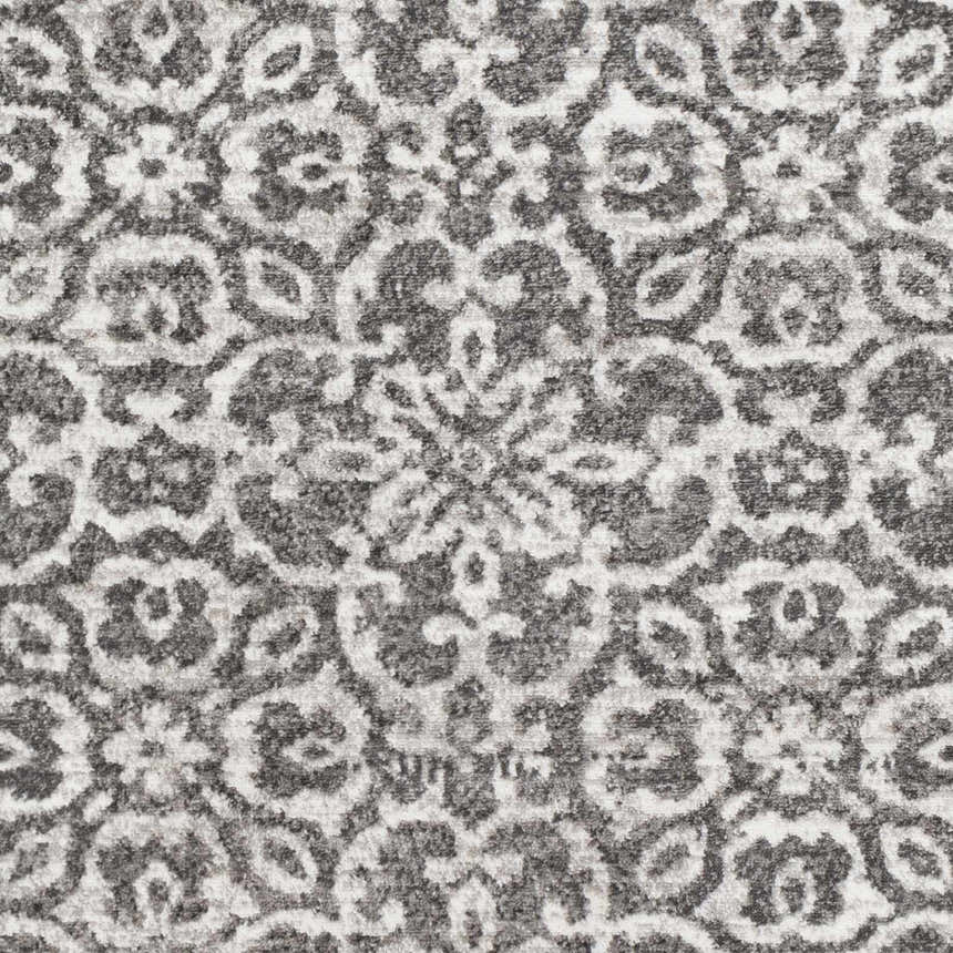 Close-up of Bowden Carpet - Clearance. Charcoal, light gray, and white floral pattern. Farmhouse style rug texture. Swatch