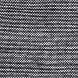 Close-up of the woven texture of the Boyden Black Area Rug, showing black and cream recycled PET yarn. Swatch