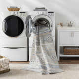 Laundry room scene with Boyko Washable Area Rug being taken out of the washing machine. Farmhouse style. Washing-Machine