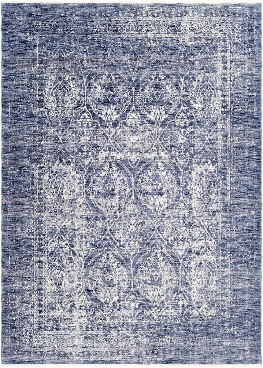 Close-up of the Barboursville Area Rug in denim and white. Features a traditional, vintage-inspired oriental pattern. Design-Rectangle-582