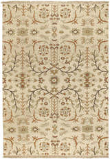 Close-up of the Brentford Carpet. Hand-knotted wool rug in oatmeal, brown, and olive with a traditional floral and branch pattern. Design-Rectangle-69