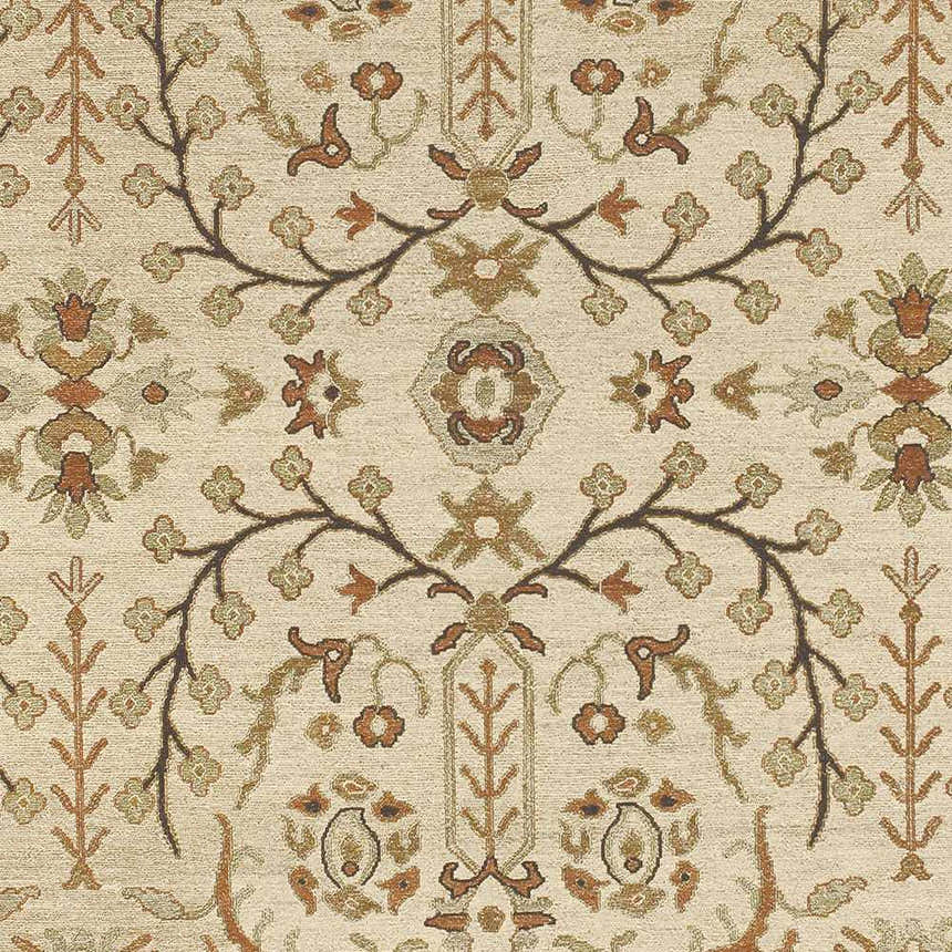 Close-up of the Brentford Carpet, a hand-knotted rug with a traditional floral pattern in brown, tan, and oatmeal tones. Swatch