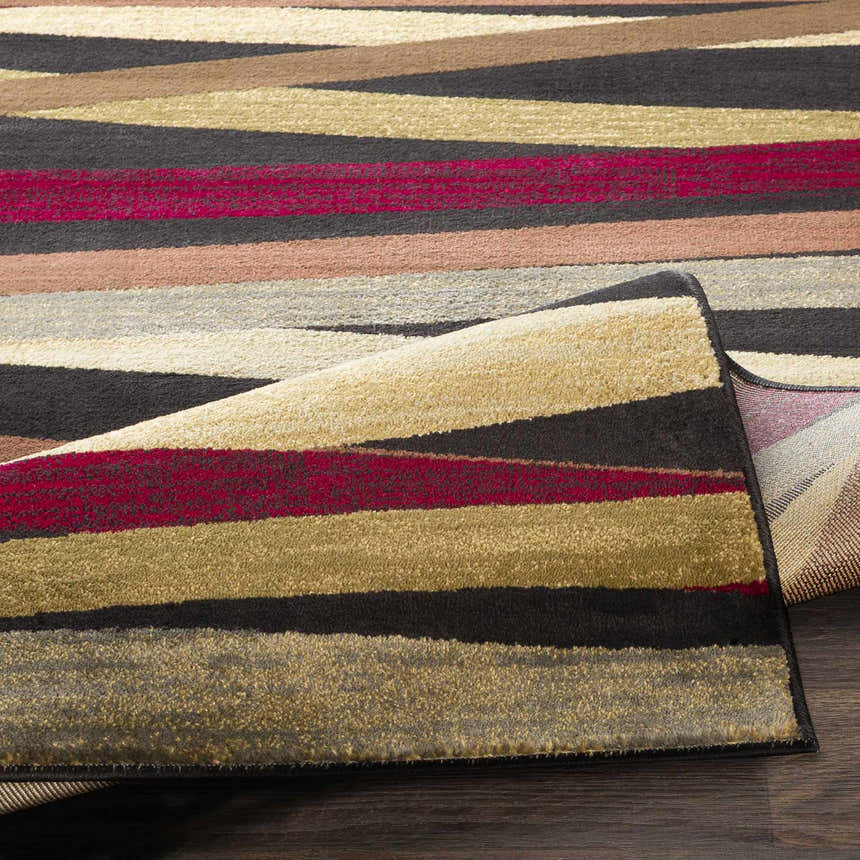 Close-up of Brevard Striped Area Rug featuring beige, brown, red, sage, and gray stripes. Machine woven texture. Contemporary style. Fold