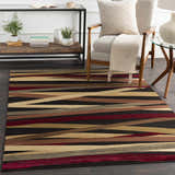Living room scene with Brevard Striped Area Rug. Contemporary style with beige chair, wood accents, and striped rug in brown, red, and beige. Roomscene-Rectangle