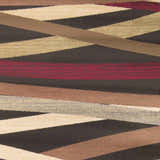 Close-up of Brevard Striped Area Rug. Beige, brown, dark red, and gray stripes create a contemporary geometric pattern. Swatch
