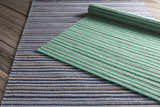 Close-up of the hand woven Bergheim Area Rug. Aqua, medium gray, and seafoam stripes on a wool runner. Styleshot