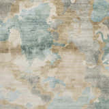 Close-up of the Briceville Premium Area Rug. Hand-knotted wool rug in ivory, medium green, pale blue, peach, and wheat. Texture