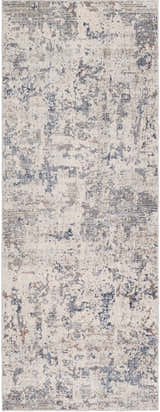 Close-up of the Broxbourne Area Rug. Abstract design in cream, white, brown and denim. Contemporary style. Design-Runner-338