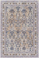 Close-up of the Barrie Area Carpet. Traditional rug with brown, charcoal, cream, and blue floral pattern on a light beige background. Design-Rectangle-5373