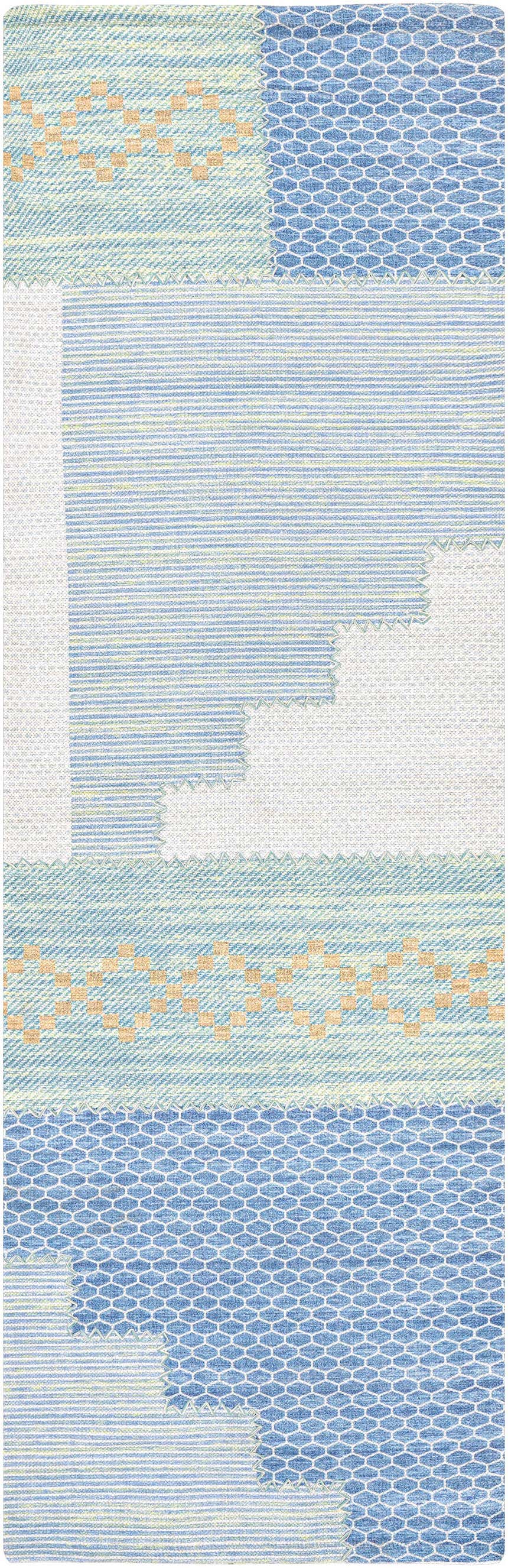 Close-up of the Bishopstoke Carpet. Hand-woven rug featuring blue, cream, and camel tones with geometric and striped patterns. Design-Runner-268