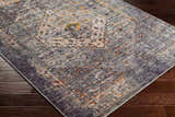 Close-up of Basiad Washable Area Rug showing traditional oriental design, blush, gray, purple, and mustard colors. Corner
