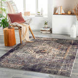 Living room scene with Basiad Washable Area Rug in blush, purple, and gray tones. Farmhouse style with modern chair and wood accents. Roomscene-Rectangle