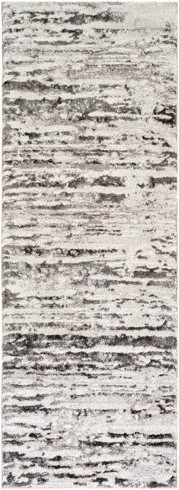 Close-up of the Butters Area Rug featuring a contemporary black, ivory, and gray abstract pattern. Design-Runner-2773