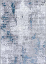 Close-up of the Bugho Area Rug, a contemporary rug in cream, gray, and denim with an abstract design. Design-Rectangle-5373