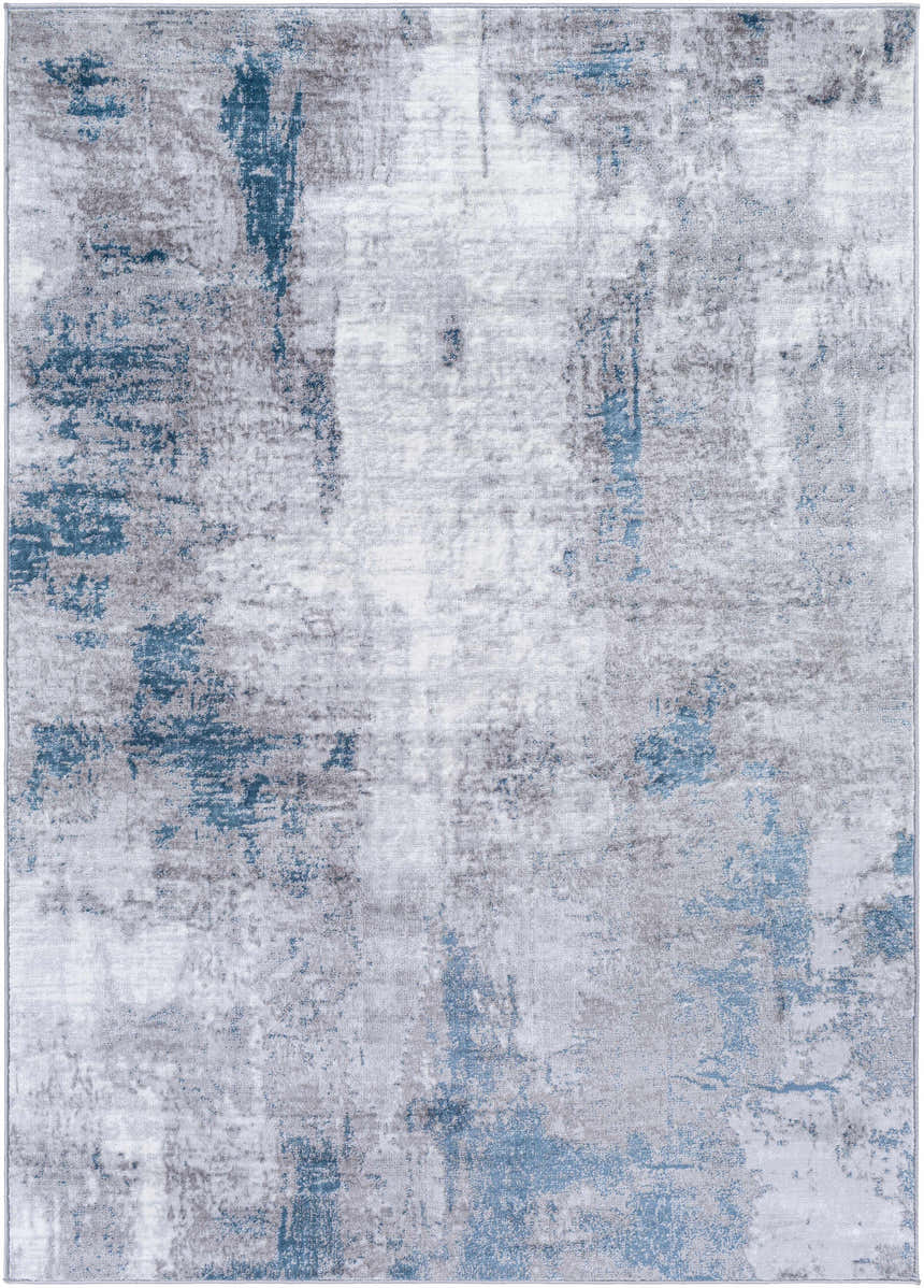 Close-up of the Bugho Area Rug, a contemporary rug in cream, gray, and denim with an abstract design. Design-Rectangle-5373