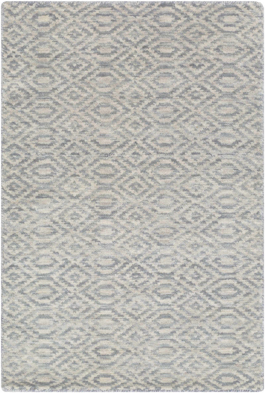 Close-up of the Bumpass Area Rug. Light sage and medium gray wool rug with a contemporary diamond pattern. Hand-knotted texture. Design-Rectangle