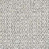 Close-up of the Bumpass Area Rug. Hand-knotted wool rug in light sage and medium gray with a contemporary geometric pattern. Swatch