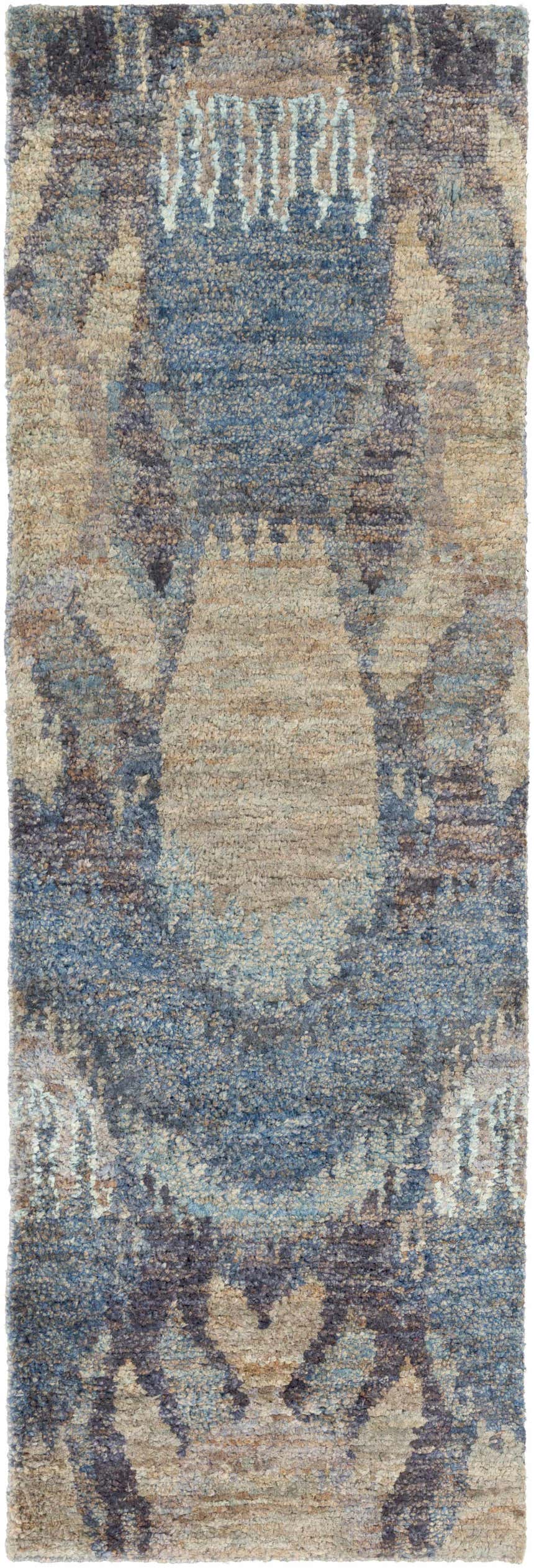 Close-up of the hand-knotted Bushong Jute Carpet. Southwestern style rug in blue, brown, gray, and white hues. Design-Runner-268