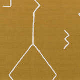 Close up of Bushra Area Rug showing mustard yellow wool and viscose with white geometric hand woven design. Swatch