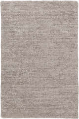 Close-up of the gray Buskirk Area Rug. Hand-loomed, contemporary style, and made of 100% viscose. Design-Rectangle-23