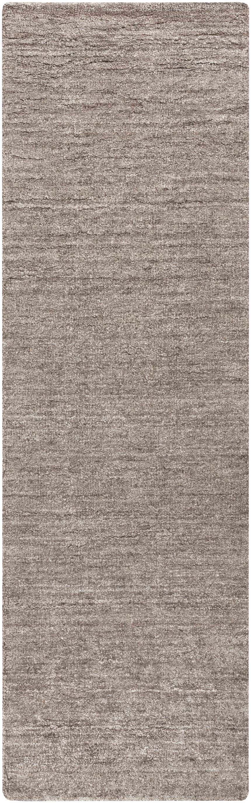 Close-up of the gray Buskirk Area Rug. This hand-loomed rug has a subtle horizontal texture. Contemporary style. Design-Runner-268