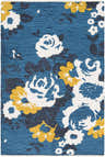 Close-up of the Byars Clearance Rug, a hand-woven cotton rug with a blue background and white and mustard floral pattern. Design-Rectangle-576