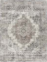 Close-up of the Manaring Charcoal Luxe Thick Area Rug, featuring a distressed oriental pattern in charcoal, cream, and brown tones. Design-Rectangle-537