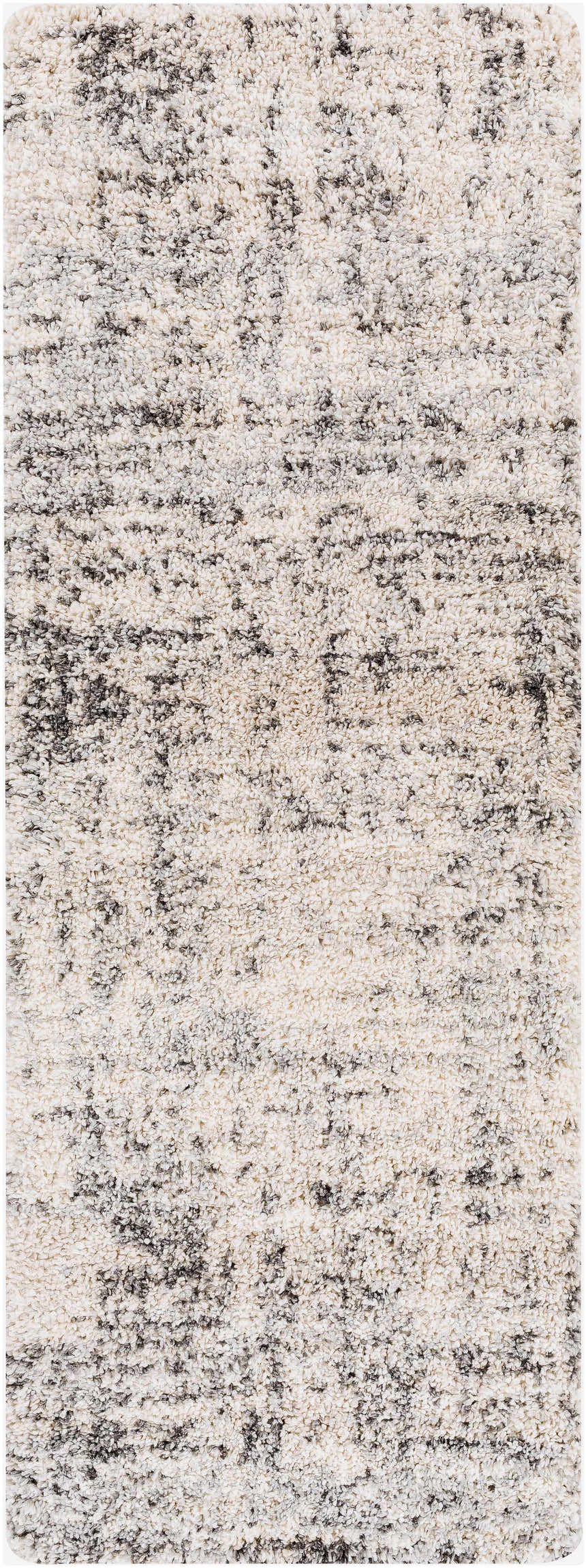 Close-up of the Calsib Area Rug. Shag rug in cream with black and light gray flecks, machine woven. Design-Runner-2773