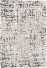 Close-up of the shag Calsib Area Rug. Black and cream abstract design. Contemporary style. Design-Rectangle-537