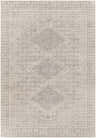 Close-up of the Calubian Area Rug in cloud gray. Machine woven polypropylene rug with diamond and geometric patterns. Design-Rectangle-57
