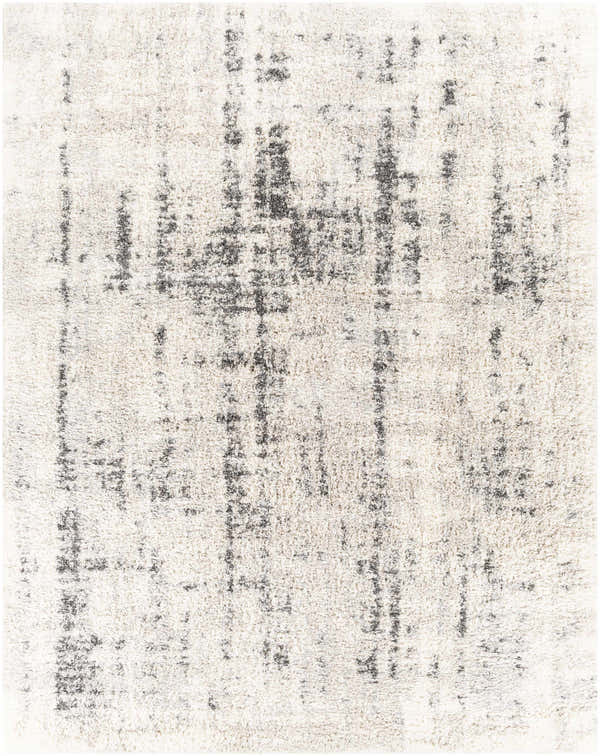 Close-up of a plush Campion Cream Rug. Features a shag texture and abstract black and beige design. Design-Rectangle-71010