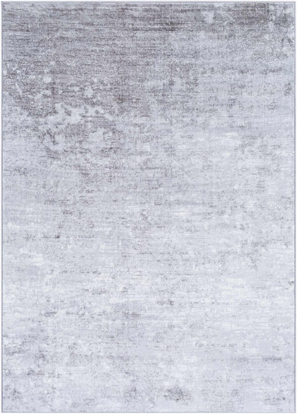 Close-up of the Canhandugan Area Rug, a contemporary design in cream, gray, and denim hues with a subtle, abstract pattern. Design-Rectangle-5373